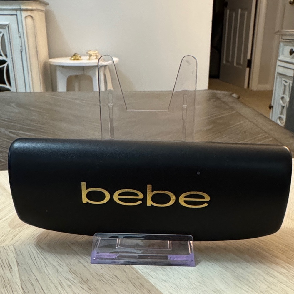 Bebe Black Glass Case with Gold Logo